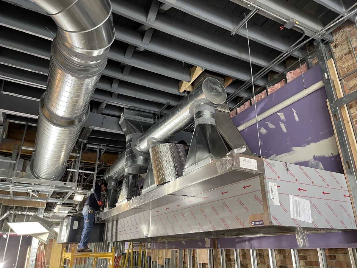 Commercial restaurant hood installation with high-capacity ventilation ductwork